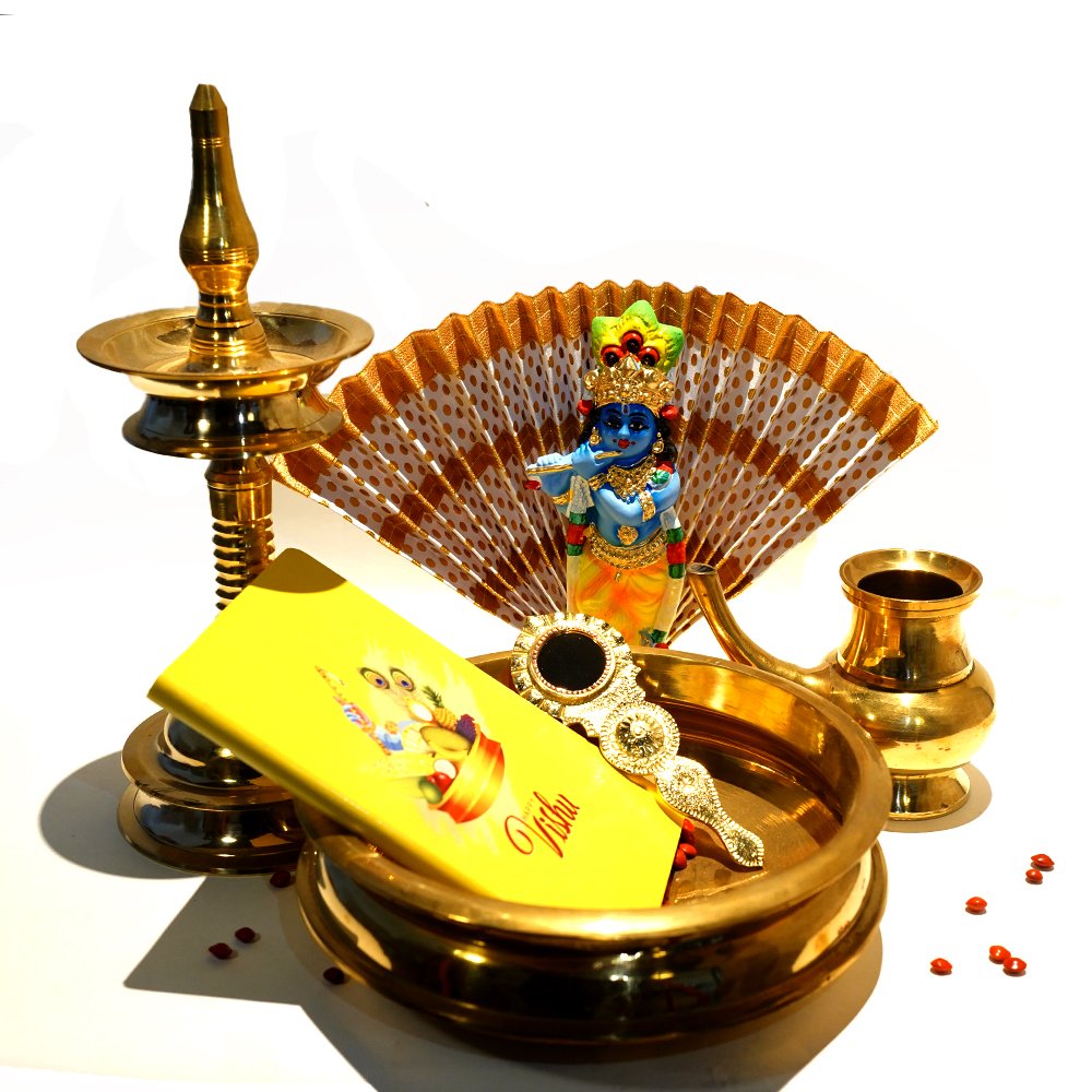 Vishu Kani Set with of Paper Mache Krishna Idol(30cm), Thiru Udayada, Uruli, Aranmula Kannadi, Nilavilaku, Nirapara, Kindi and Manjadi kuru