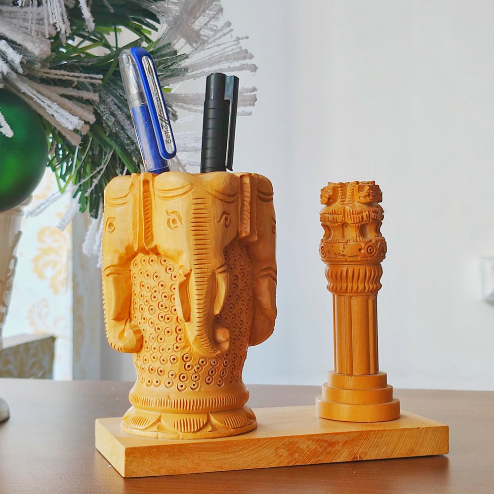 Ashoka Pillar Tabletop Pen Holder crafted in white wood with 4 elephant head carving thumbnail 1